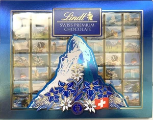 Schweizer Ansichten SOUVENIR 278g Lindt Napolitains 49 Mini Täfelchen Vollmilch - Bild 1 von 2