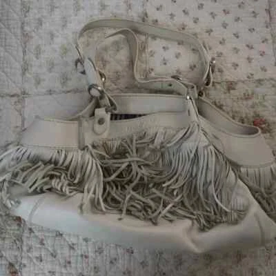 Bolso de mano Hogan con borla de cuero blanco Foto 1 de 4