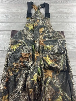 Винтажный мужской нагрудник Remington большой камуфляж RealTree для охоты на открытом воздухе 90-е изолированный - Изображение 1 из 4