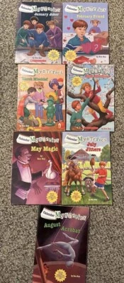Lot of 7 Calendar Mysteries by Ron Roy January through May, July And August - Image 1 of 4