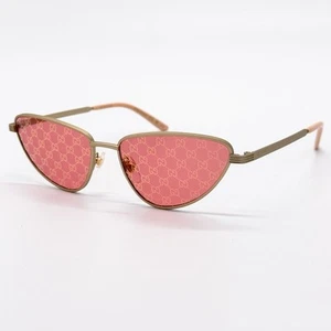 Occhiali da sole Gucci GG1879S 004 oro opaco rosso Gucci modello logo lenti cateye - Foto 1 di 10