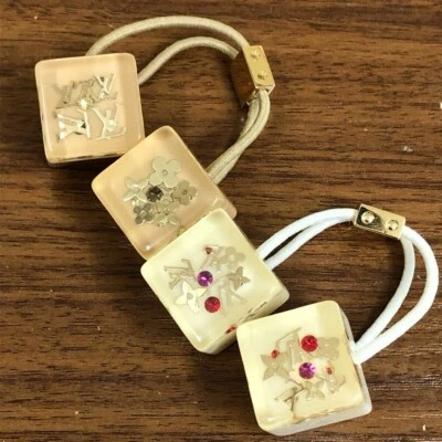 Authentic Louis Vuitton Inclusion Hair Cube Hair Accessory Hair Tie White Ivory - Image 1 of 4
