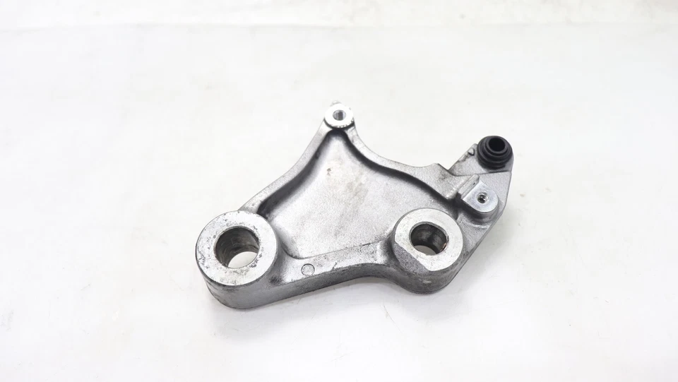 1996 HONDA SHADOW ACE 1100 REAR BACK BRAKE CALIPER MOUNT BRACKET - Image 1 of 4