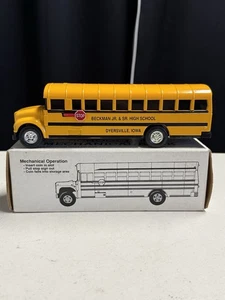 New Ertl School Bus Mechanical Bank Beckman Jr + Sr High School Dyersville Iowa - Picture 1 of 7