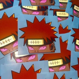CALCOMANÍA DE COCHE PEEKER DE ANIME REFLECTANTE DE DOLOR NARUTO SHIPPUDEN AKATSUKI - Imagen 1 de 2