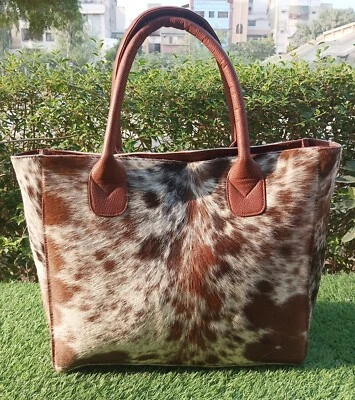 Bolso de mano para mujer de cuero genuino con estampado de animales de vaca Foto 1 de 3
