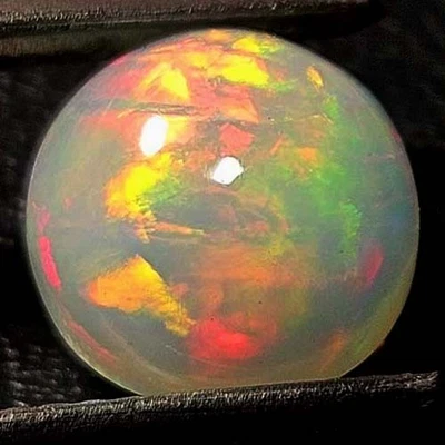 NATURAL AAA+ VVS BEAUTIFUL COLOR PLAY ROUND CABOCHAN ETHIOPIAN WELO OPAL 1.65CTS - Image 1 of 3