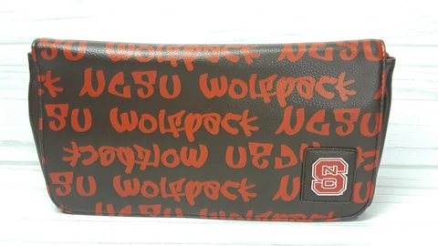 NC State University Wolfpack Graffiti Clutch Purse by Sara. NCAA licensed Cover