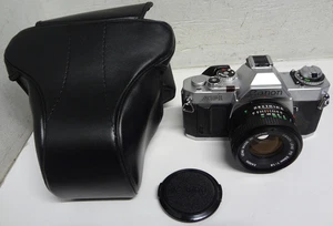 Canon AV-1 analoge Spiegelreflexkamera 35 mm mit FD 50 mm 1:1,8 Objektiv mit Etui - kostenloser Versand!!! - Bild 1 von 11