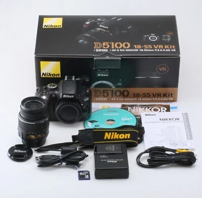 【NEUWERTIG】Nikon D5100 24.2 MP+AF-S DX 18-55mm f/3.5-5.6GIIVR Objektiv Shutte... - Bild 1 von 4