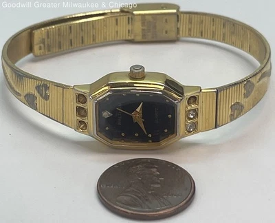 Reloj Waltham tono dorado W073 cuarzo damas esfera negra con correa para el corazón 22,0 g Foto 1 de 4