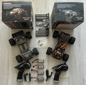 2 EA Haiboxing 1:18 18859/18868 4WD RC Off Road Trucks elektrisch leicht gebraucht L355 - Bild 1 von 14