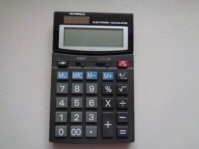 ELECTRONIC CALCULATER Battery and Solar powered Large 7in x4.3ins Used. - Image 1 of 4
