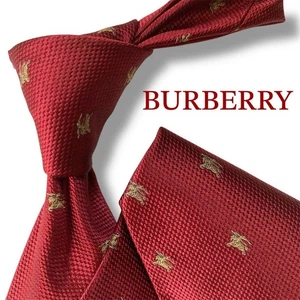 Cravatta Burberry bordeaux con logo cavallo ricamato realizzata in buone condizioni - Foto 1 di 10