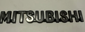 Mitsubishi OEM 1997-2002 Diamante Rear Trunk Emblem Badge Logo Name MR108148 - Picture 1 of 3