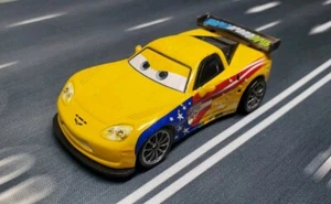 Disney/Pixar CARS 2 World Grand Prix Jeff Gorvette 24 Car Yellow Stars Stripes - Picture 1 of 8