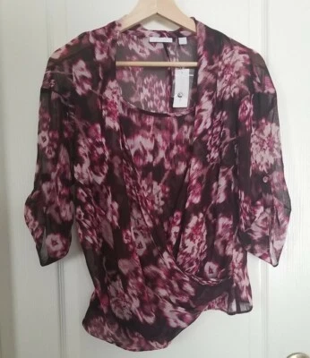 Top New York & Co para mujer XS rosa capa simulada 3/4 lengüeta enrollable transparente Foto 1 de 4