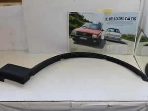FIAT UNO TURBO I.E - DEL 85 - RIVESTIMENTO ARCO PASSARUOTA ANTERIORE DX - Picture 1 of 2