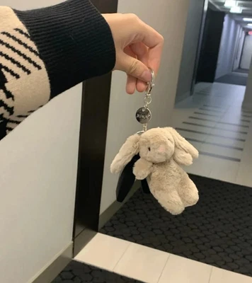 Dije bolsa de conejito Jellycat - Llavero de felpa suave Foto 1 de 4
