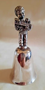 Pewter and Silver Bell, Reed & Barton, Boy holding Train, 4" Tall - Picture 1 of 3