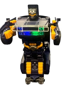 TRANSFORMER POLICE CAR, BATTERY OPERATED, IT MOVES ITSELF, MUSIC AND LIGHT - Picture 1 of 8
