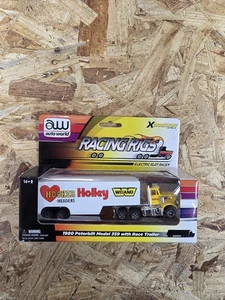 Auto World 1980 Peterbilt Modelo 359 con remolque COMP LEVAS Coche Ranura Eléctrico HO - Imagen 1 de 2