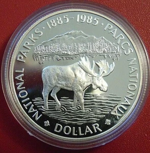Dólar de plata Canada Moose 1985 encapsulado prueba como PL SIN USAR, EN CAJA CERTIFICADO DE AUTENTICIDAD - Imagen 1 de 6