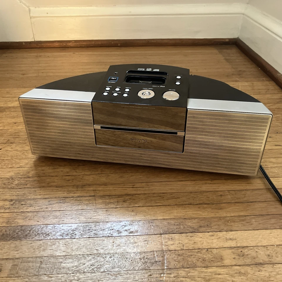 Sistema de entretenimiento de acoplamiento Philips para iPod DCM230 230/37 plateado Foto 1 de 4