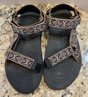 Sandalia para mujer Teva Hurricane 6407 negra/bronceada senderismo deporte aire libre talla 8 Foto 1 de 4