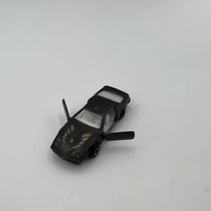 Vintage Black Pontiac Firebird Trans Am made in Hong Kong doors open - Picture 1 of 6
