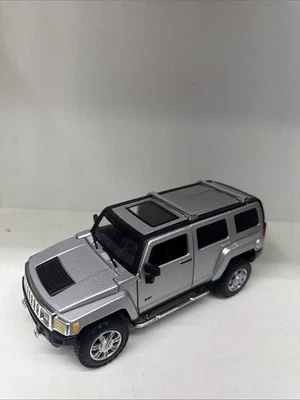 Welly Hummer H3 Die Cast Car 43629 Licensed 4 1/2 Inches Pullback Silver - Image 1 of 2