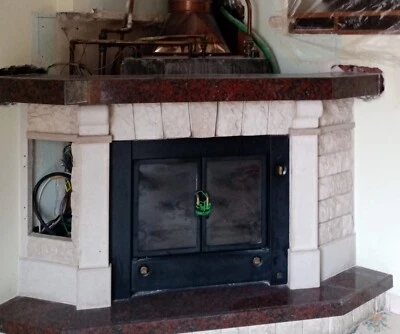 Vendesi termocamino e rivestimento granito e pietra - Immagine 1 di 2