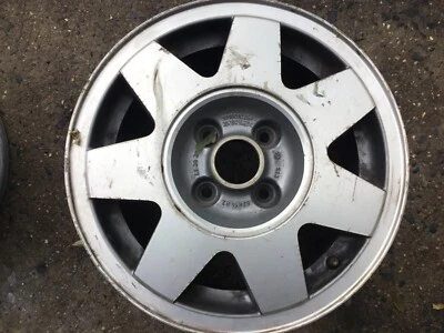 VW VOLKSWAGEN jetta passat 7 spoke star WHEEL RIM 4 LUG quantum - Image 1 of 2