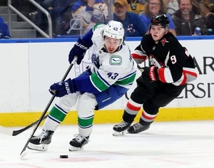 Quinn Hughes Skating Action Vancouver Canucks 8x10 NHL Hockey Photo - Picture 1 of 1
