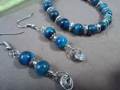 Pulsera y pendientes ojo de tigre azul Foto 1 de 4