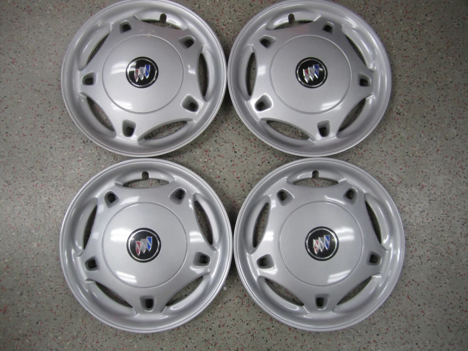 Cubierta de rueda plateada Buick Skylark 1992-1993 14" OEM 22568952 1136 - Juego/4* Foto 1 de 4