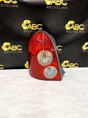 Conjunto de luz trasera izquierda conductor Mazda Protege PR5 2002-2003 FABRICANTE DE EQUIPOS ORIGINALES Foto 1 de 4