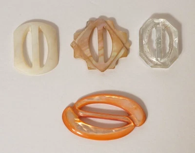 Cuatro hebillas deslizables antiguas vintage; tres madreperla y un vaso "CHEZ" Foto 1 de 4