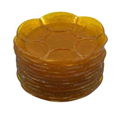 Juego de 12 posavasos vintage de plástico brillo dorado flor festoneada MCM Foto 1 de 4