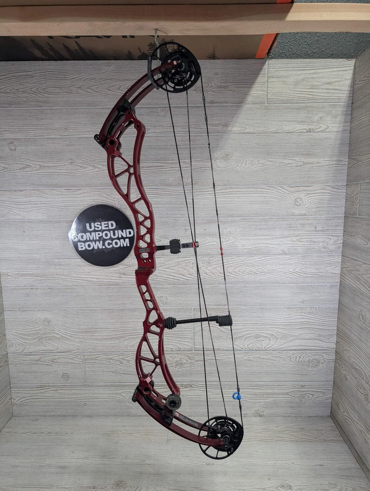 Arco rojo Bowtech Reckoning 35 60 lb diestro usado Foto 1 de 4