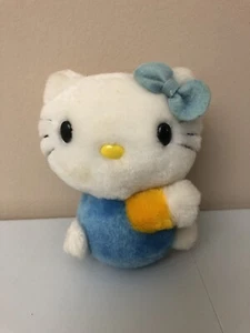 Ropa de peluche Sanrio Hello Kitty 1976 vintage 5 pulgadas azul/amarillo - Imagen 1 de 6