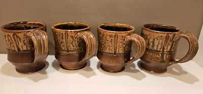 Juego de 4 tazas de gres Royce Yoder esmalte de ceniza marrón firmadas Foto 1 de 4