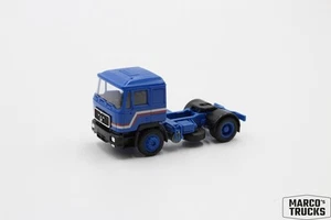 Herpa MAN F90 tractor unit 2-axle 4x2 blue/red/black 1:87 /H23593 - Picture 1 of 1