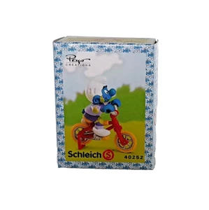 Schleich 40252 "Puffo con Bicicletta" Peyo - Cina NUOVO - Imagen 1 de 6