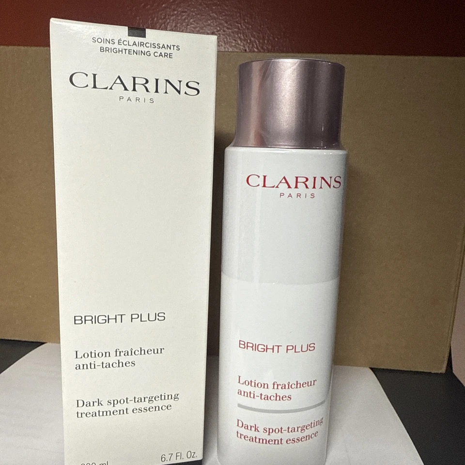Clarins Paris Bright Plus Dark Spot Targeting Treatment Essence 6.7 oz TESTER BX - Image 1 of 4