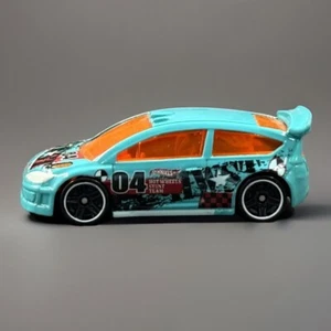 2012 Hot Wheels #198 Thrill Racers: City Stunt #3/5 Citroen C4 Rally Teal - Foto 1 di 8