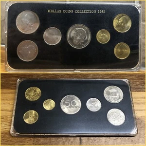 COLLEZIONE MONETE HELLAS 1982 CON CUSTODIA DRACMA GRECA MONETE 1, 2, 5, 10, 20, 50 e 50 - Foto 1 di 9