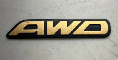 SUBARU OUTBACK AWD REAR HATCH EMBLEM OEM "AWD" TRUNK DECKLID LIFTGATE GATE GOLD - Image 1 of 2