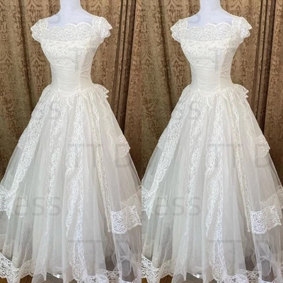 Vestidos de novia vintage fuera del hombro línea A apliques de encaje retro bata de novia Foto 1 de 4