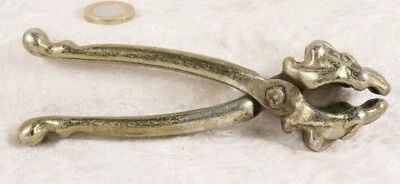 Unmarked lion head nut crackers brass 6 inches long vintage item heavy - Image 1 of 3